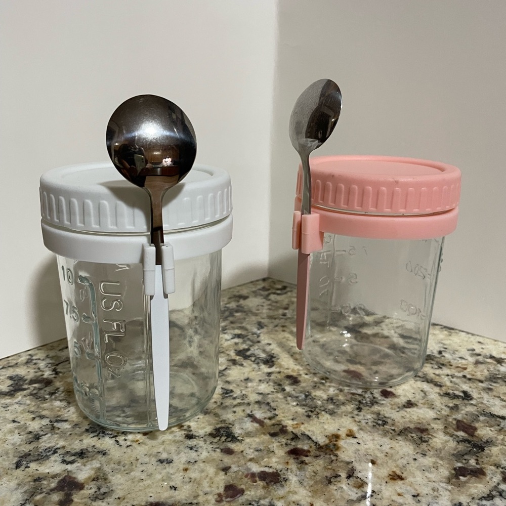 Glass Jars with White and Pink Lids and Spoons